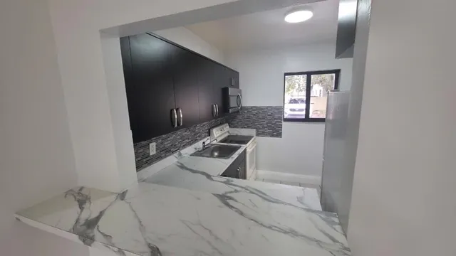 a view of a bathroom with a sink