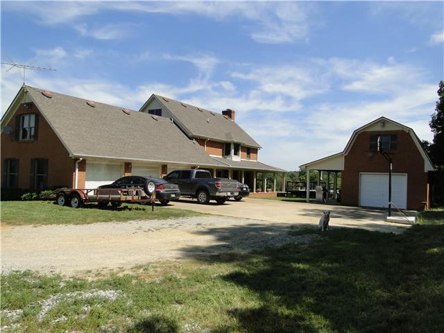 2386 Joe Brown Road Spring Hill, TN 37174 - Photo 2 of 20 Back of house showing pool and 2 story barn