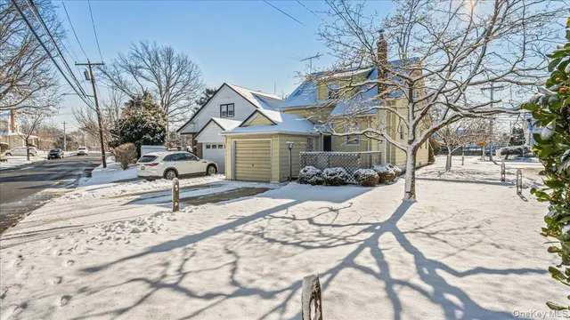 a house with trees in the background