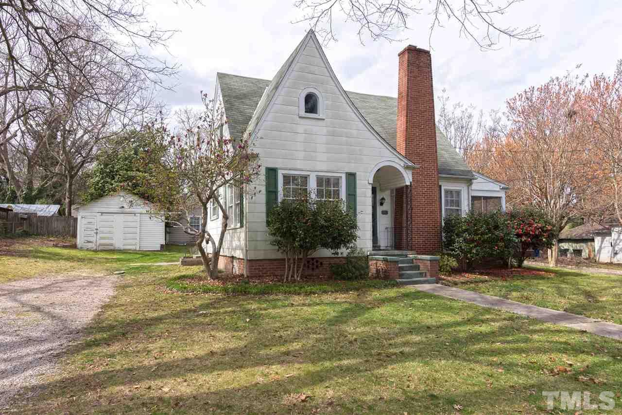 523 Elm Street Raleigh, NC 27604 - Photo 3 of 22 a front view of a house with a yard