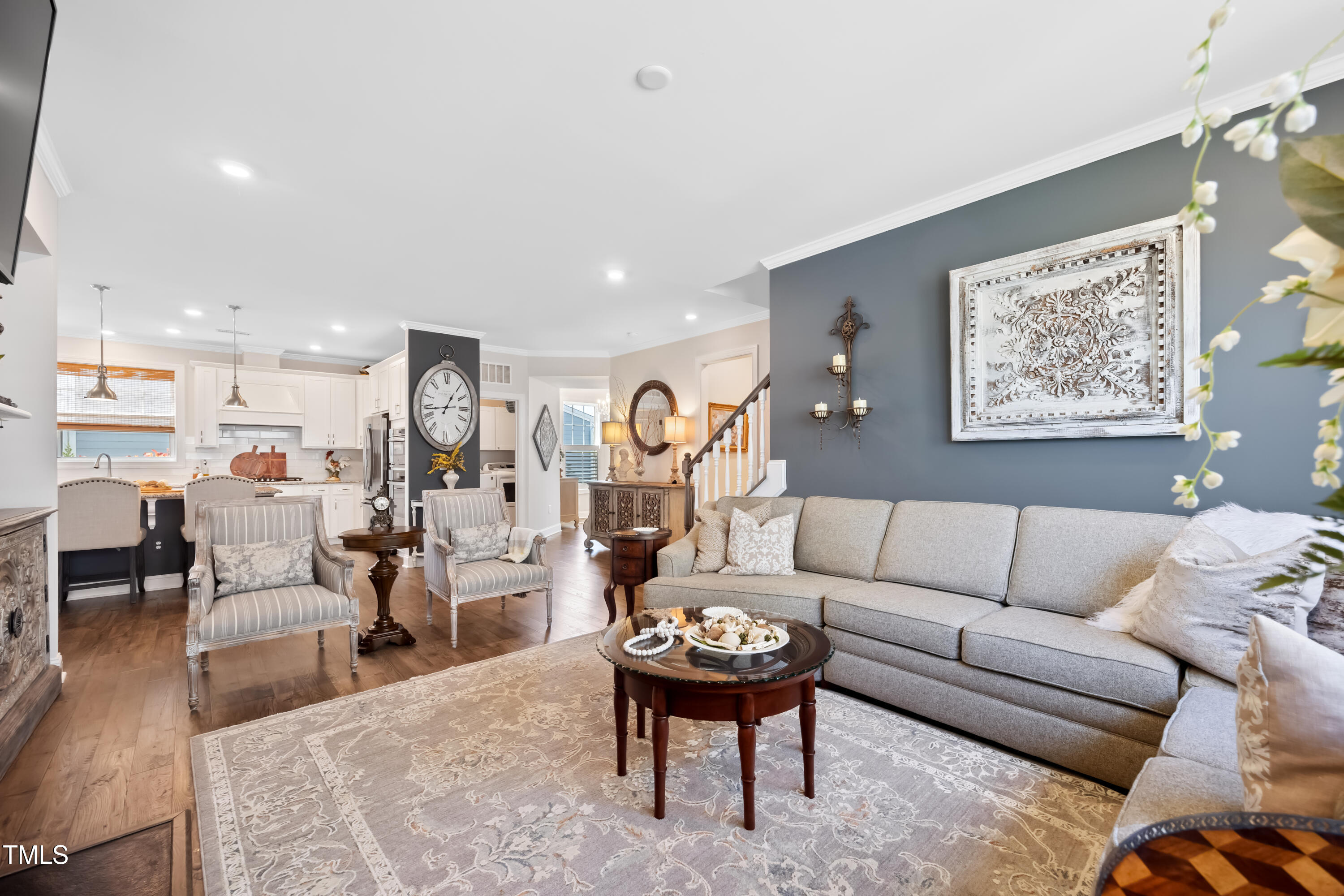 94 Two Creeks Loop Chapel Hill, NC 27517 - Photo 11 of 59 a living room with furniture kitchen view and a table