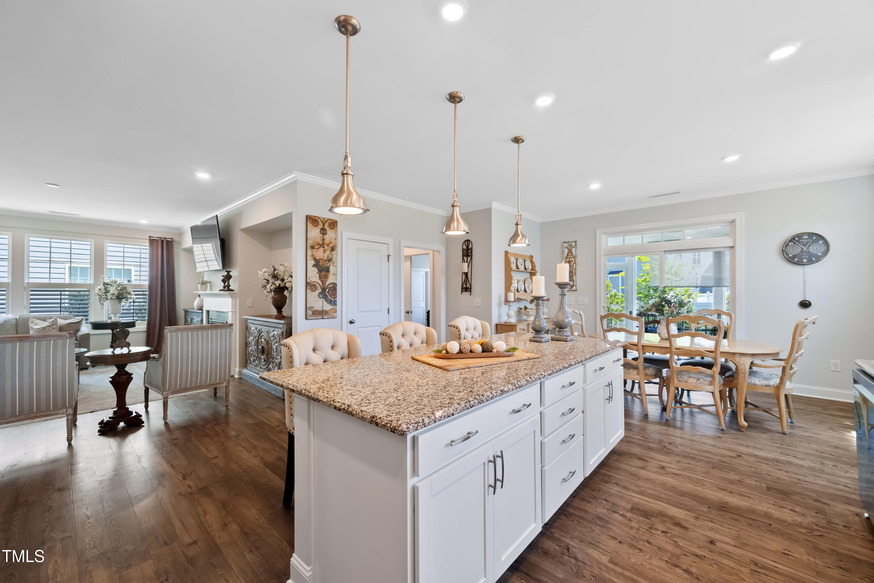94 Two Creeks Loop Chapel Hill, NC 27517 - Photo 21 of 59 a view of living room and kitchen with a wooden floor