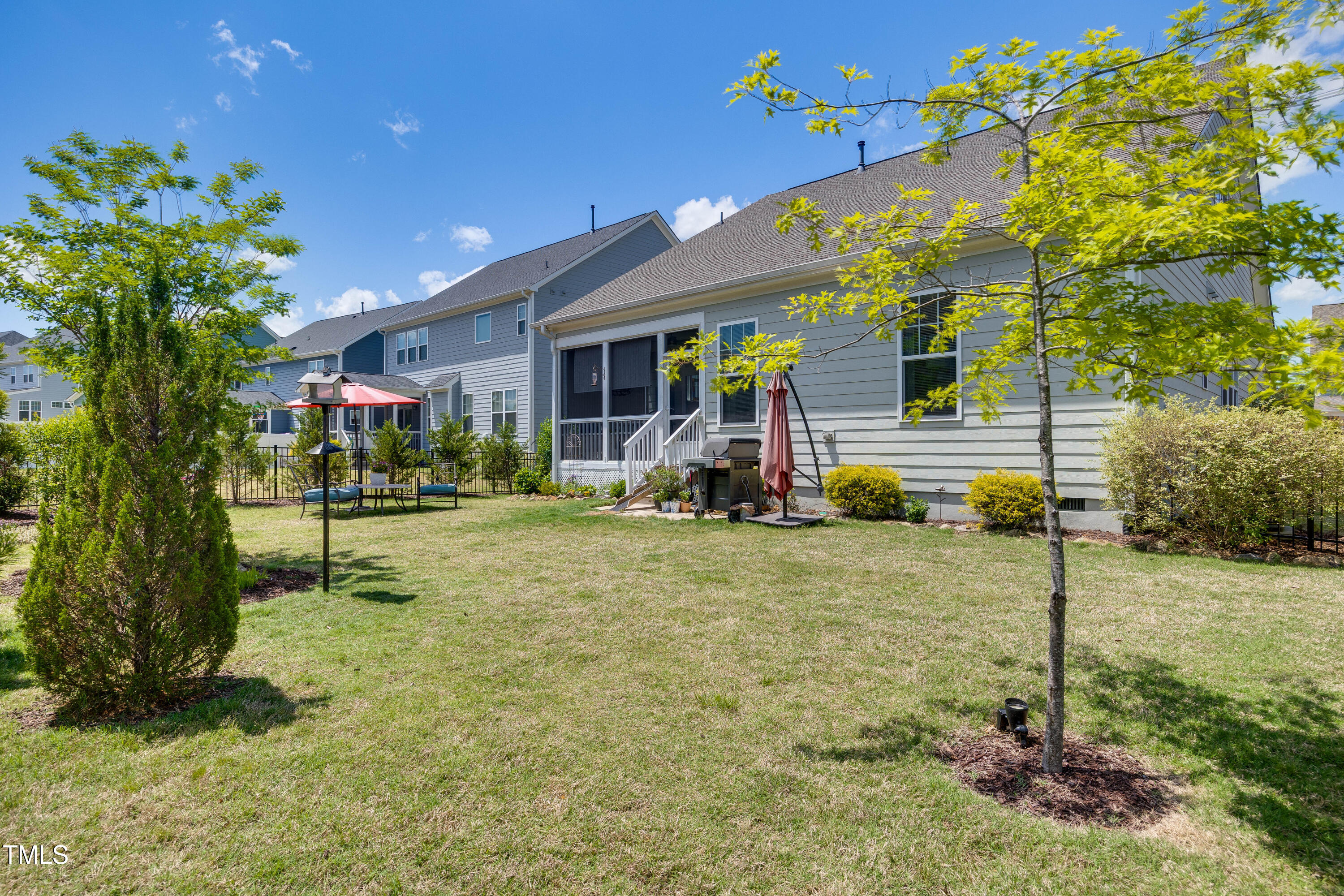 94 Two Creeks Loop Chapel Hill, NC 27517 - Photo 43 of 59 a front view of a house with a yard