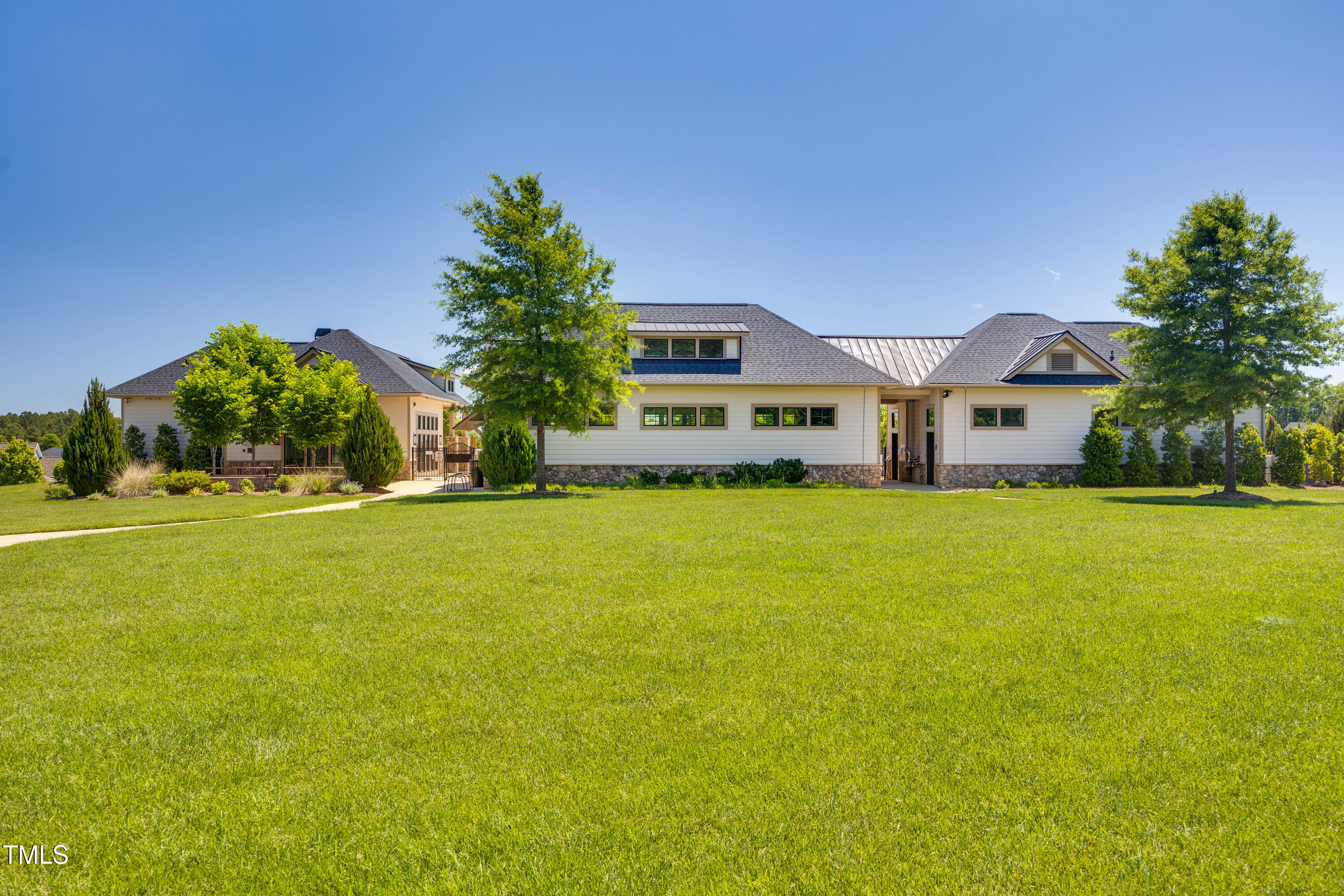 94 Two Creeks Loop Chapel Hill, NC 27517 - Photo 46 of 59 a house view with swimming pool in front of it