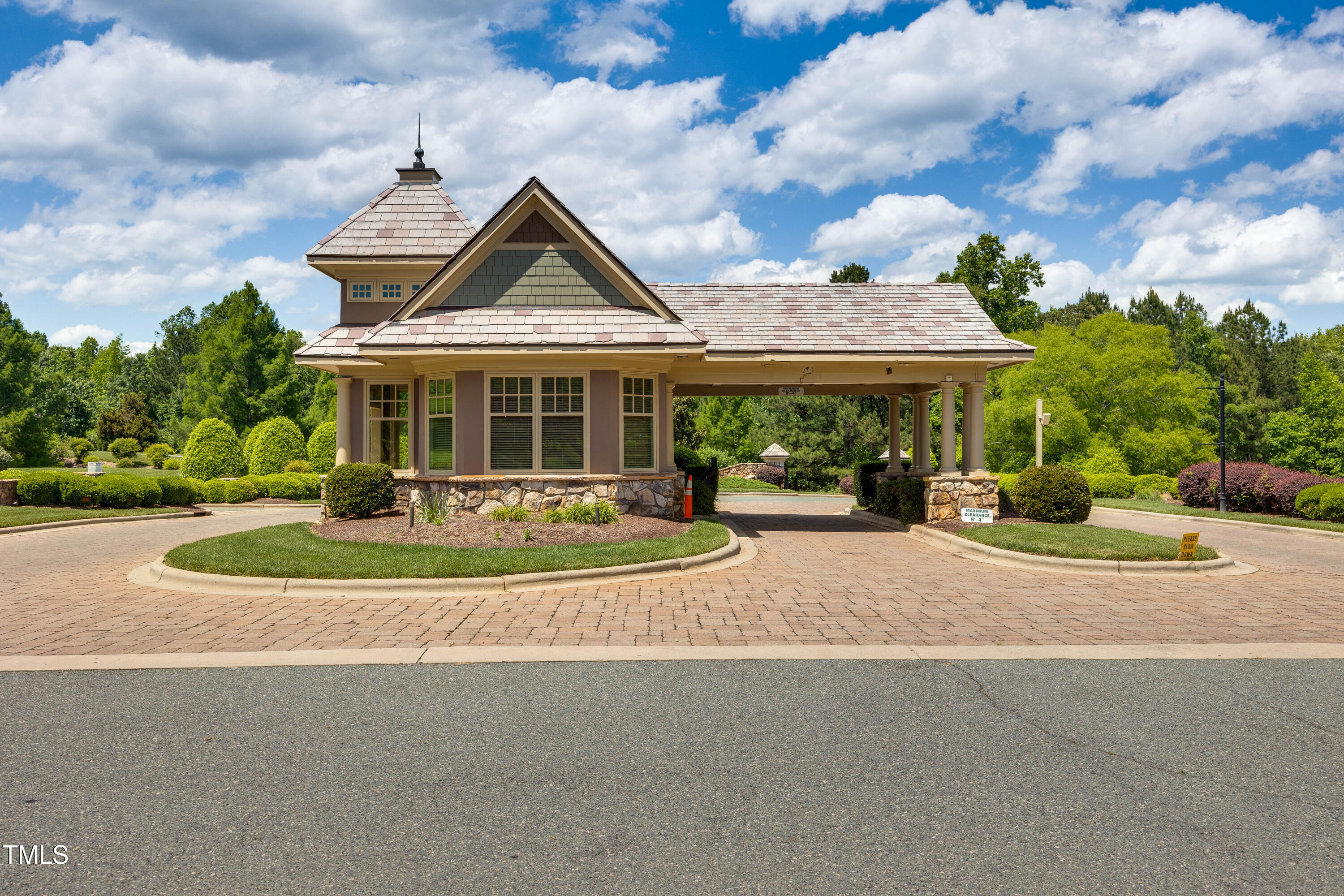 94 Two Creeks Loop Chapel Hill, NC 27517 - Photo 54 of 59 a front view of a house with a yard table and chairs