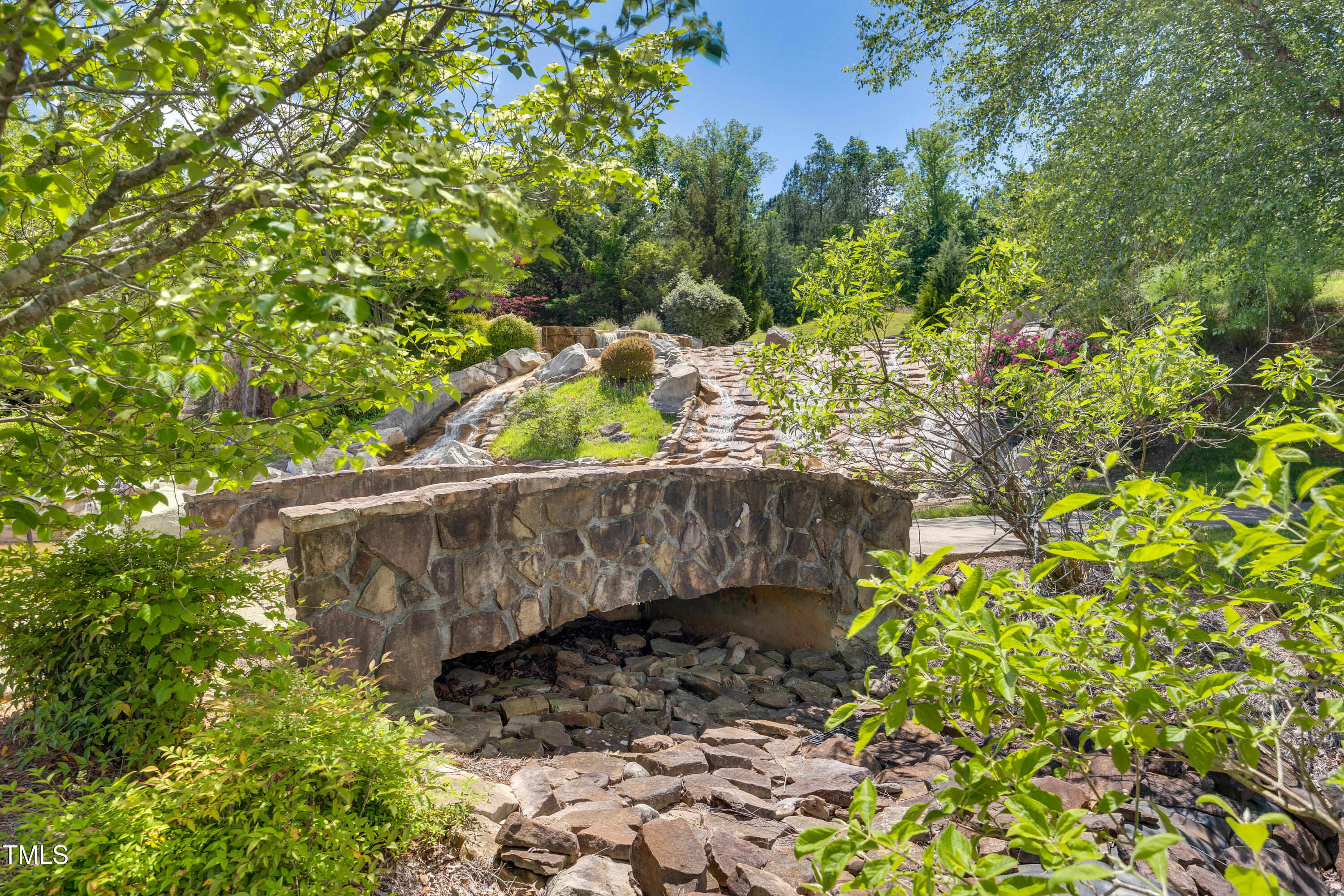 94 Two Creeks Loop Chapel Hill, NC 27517 - Photo 56 of 59 a view of a tree with a yard