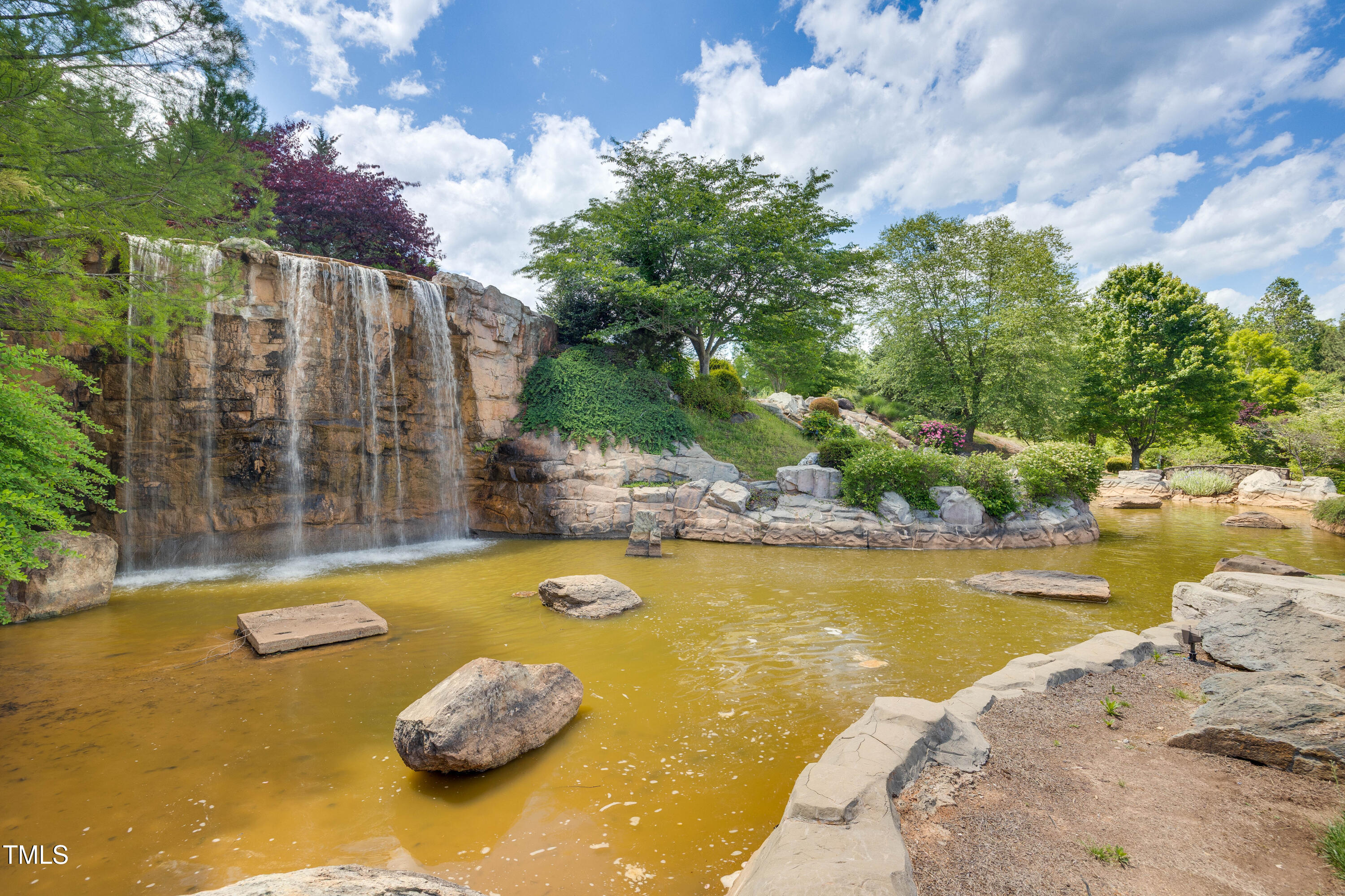 94 Two Creeks Loop Chapel Hill, NC 27517 - Photo 58 of 59 a view of a swimming pool with an ocean view