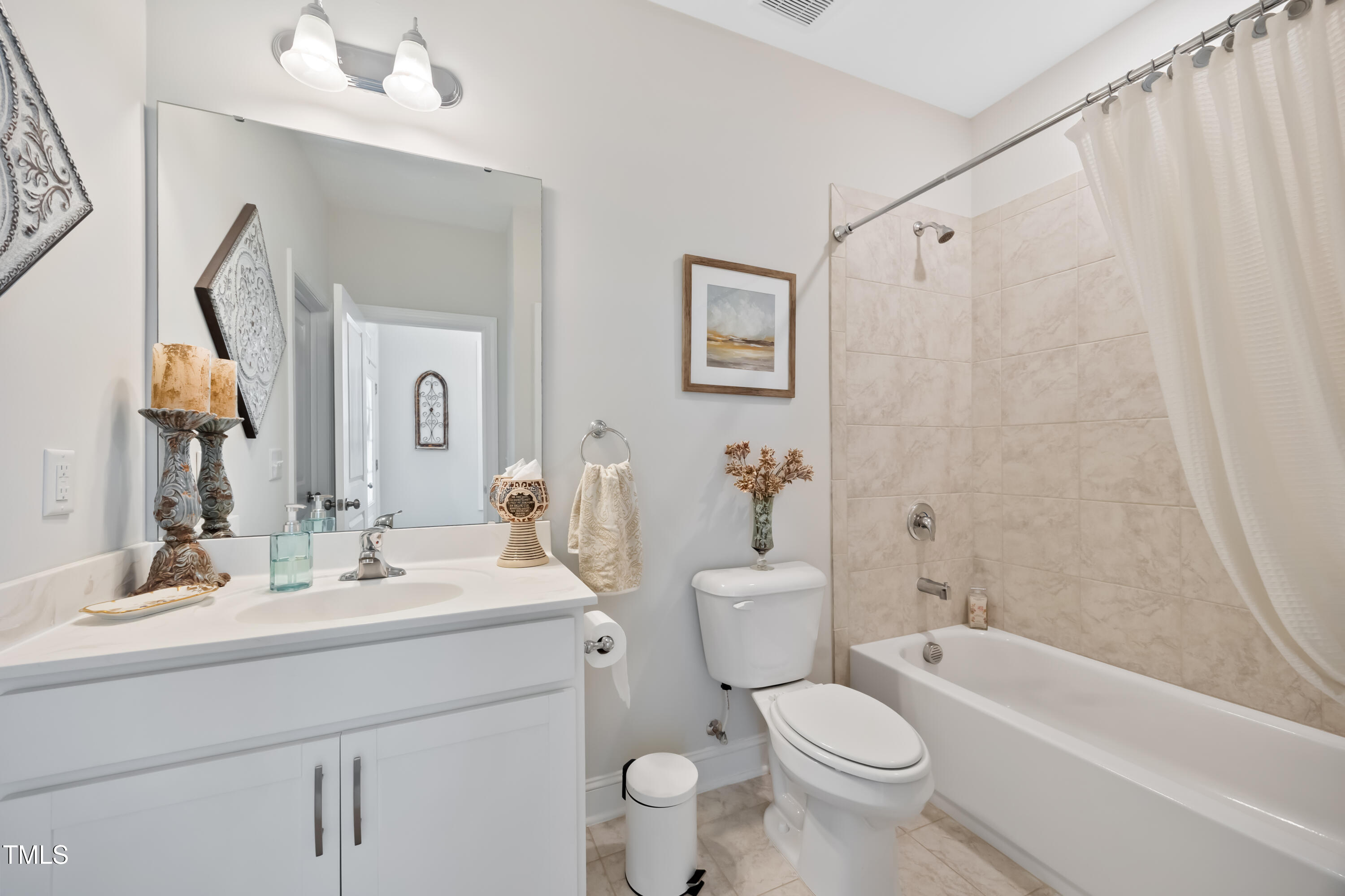 94 Two Creeks Loop Chapel Hill, NC 27517 - Photo 10 of 59 a bathroom with a sink a toilet and a bathtub