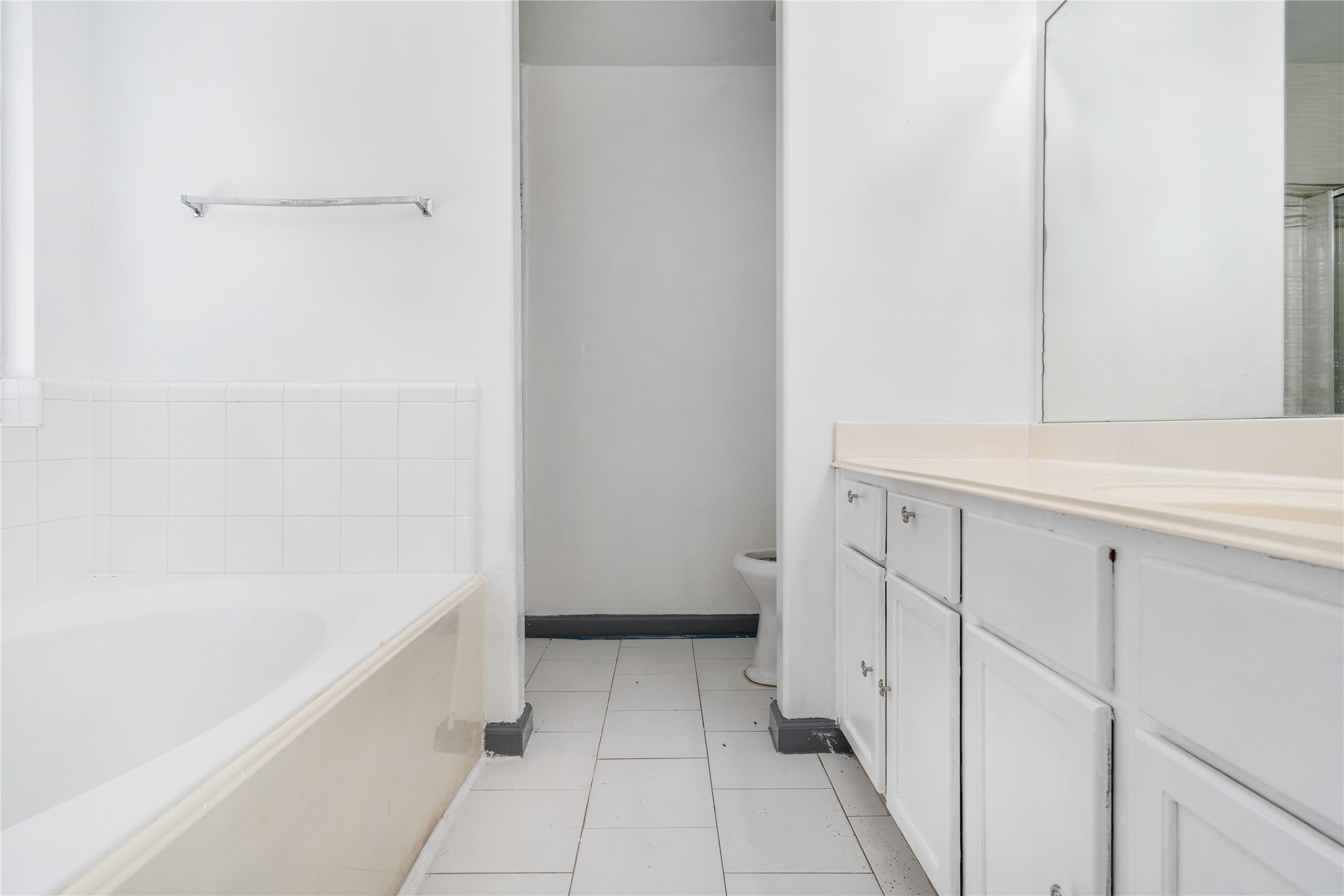 19431 River Bottom Road Katy, TX 77449 - Photo 12 of 12 a bathroom with a bathtub