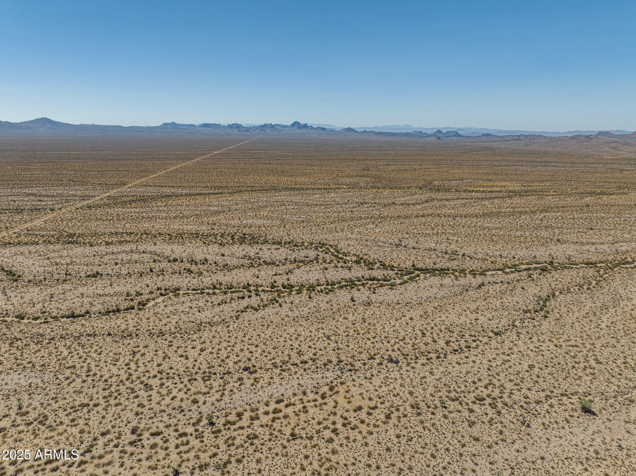 0 Pipeline Rd Lake Yucca, AZ 86438 - Photo 14 of 53 a view of an ocean beach and mountain