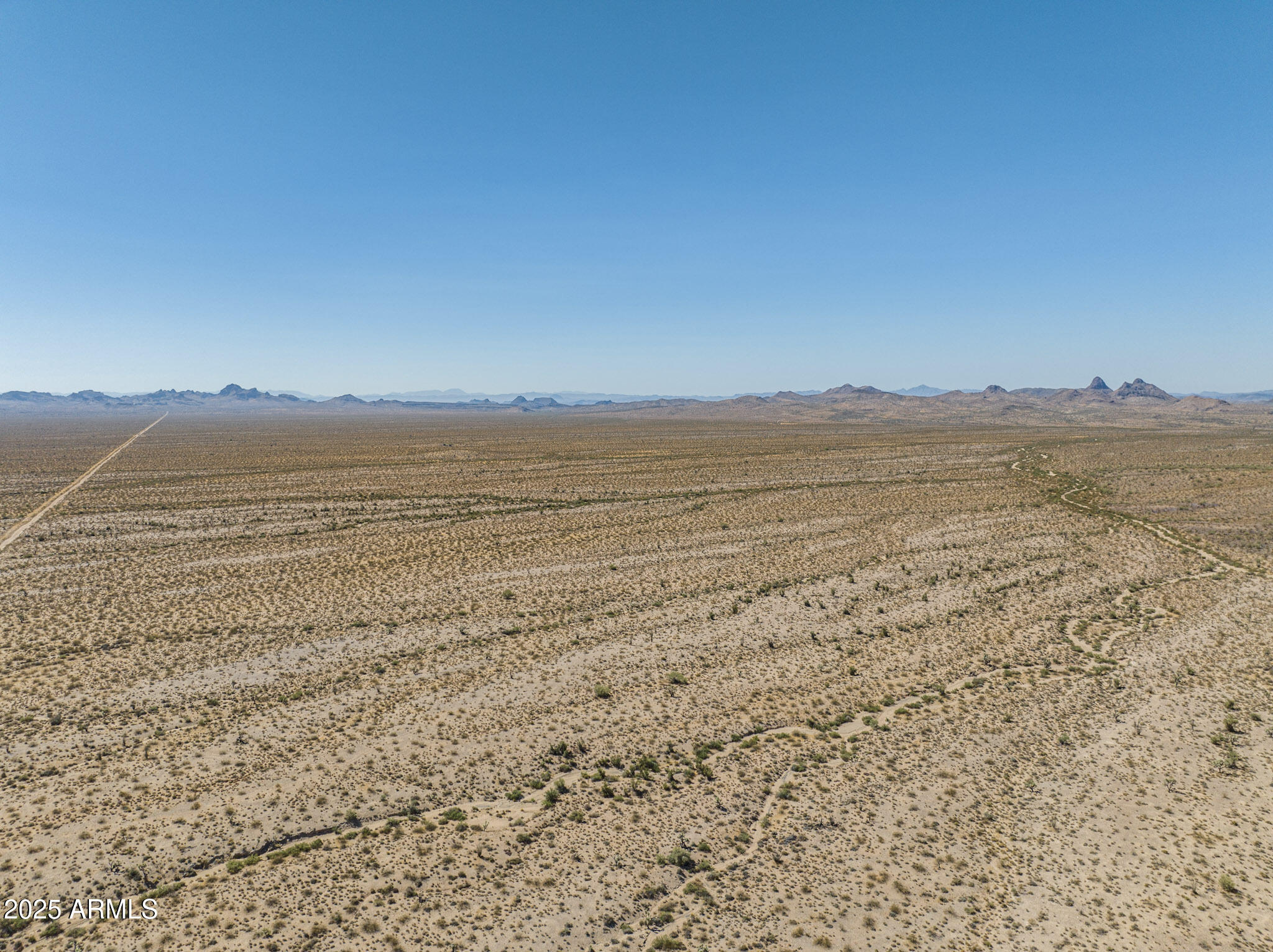 0 Pipeline Rd Lake Yucca, AZ 86438 - Photo 19 of 53 a view of an ocean beach and mountain