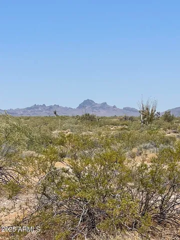 a view of mountain with sunset view