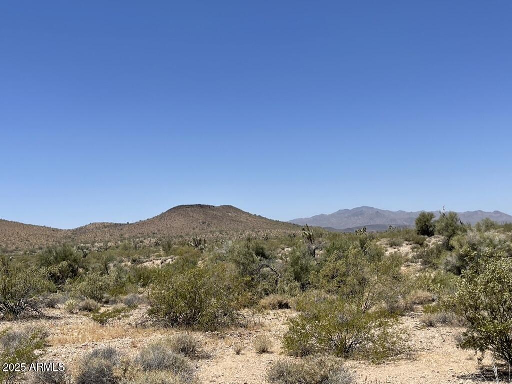 0 Pipeline Rd Lake Yucca, AZ 86438 - Photo 48 of 53 a view of a mountain range with trees in the background