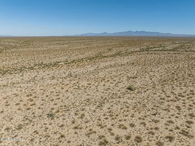 a view of lake and mountain