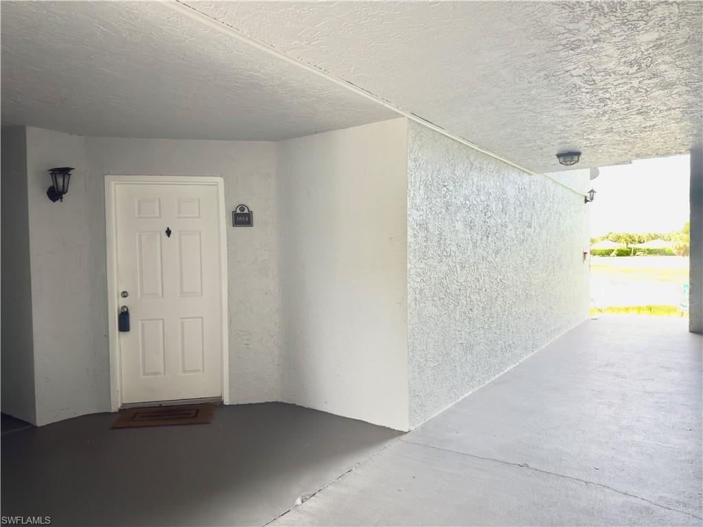 13615 Eagle Ridge Drive, Unit 1614 Fort Myers, FL 33912 - Photo 22 of 34 Outdoor recreation area featuring basketball and pickleball courts