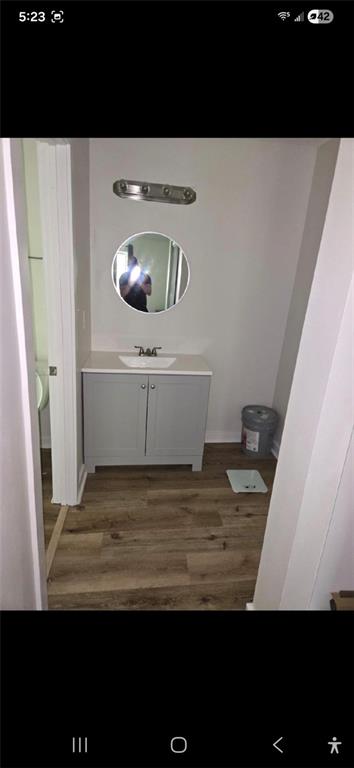 1086 Village Road Stone Mountain, GA 30088 - Photo 18 of 22 a view of kitchen island with wooden floor
