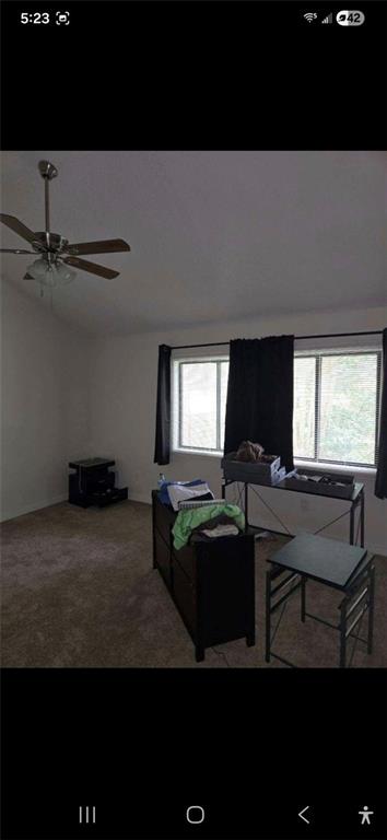 1086 Village Road Stone Mountain, GA 30088 - Photo 20 of 22 a living room with furniture a window and a table