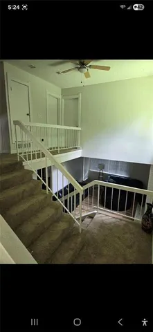 a view of a house with a big yard