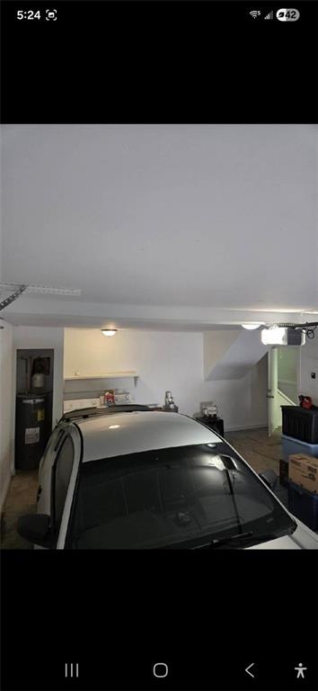 1086 Village Road Stone Mountain, GA 30088 - Photo 9 of 22 a bathroom with a sink and a mirror