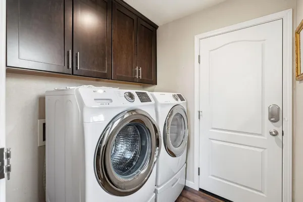 a utility room with dryer and washer