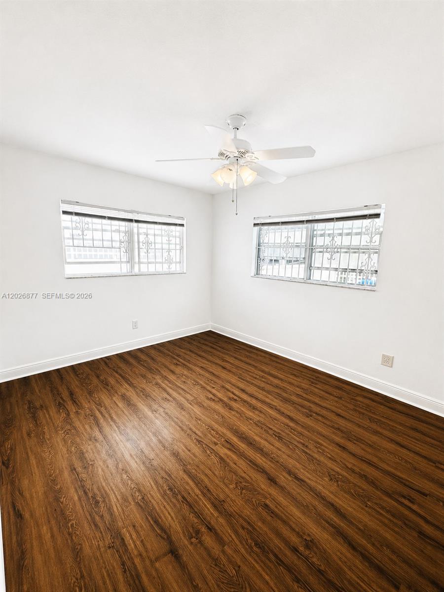 2727 Southwest 24th Street Miami, FL 33145 - Photo 5 of 18 wooden floor in an empty room