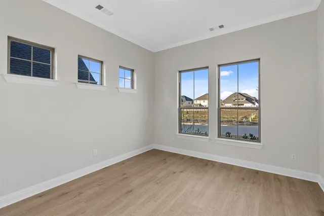 a view of a hallway with a chandelier