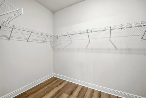 a view of a room with racks on the wall