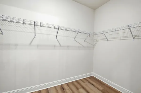 a view of a room with racks on the wall