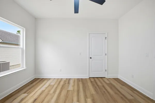 an empty room with window