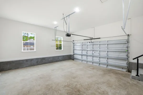 a view of a garage with stairs