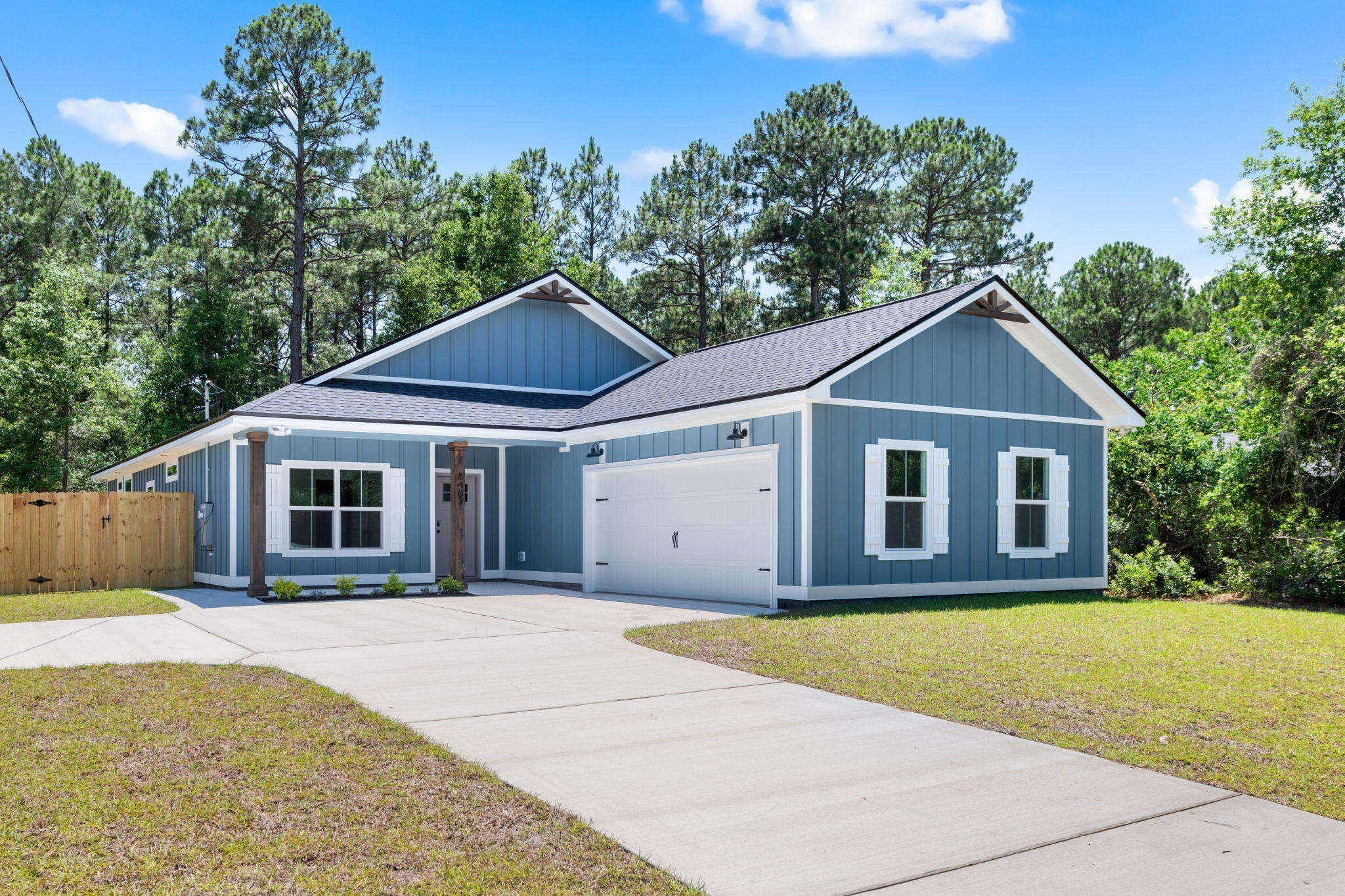 1854 Wheeler Road Gulf Breeze, FL 32563 - Photo 4 of 11 a front view of a house with yard