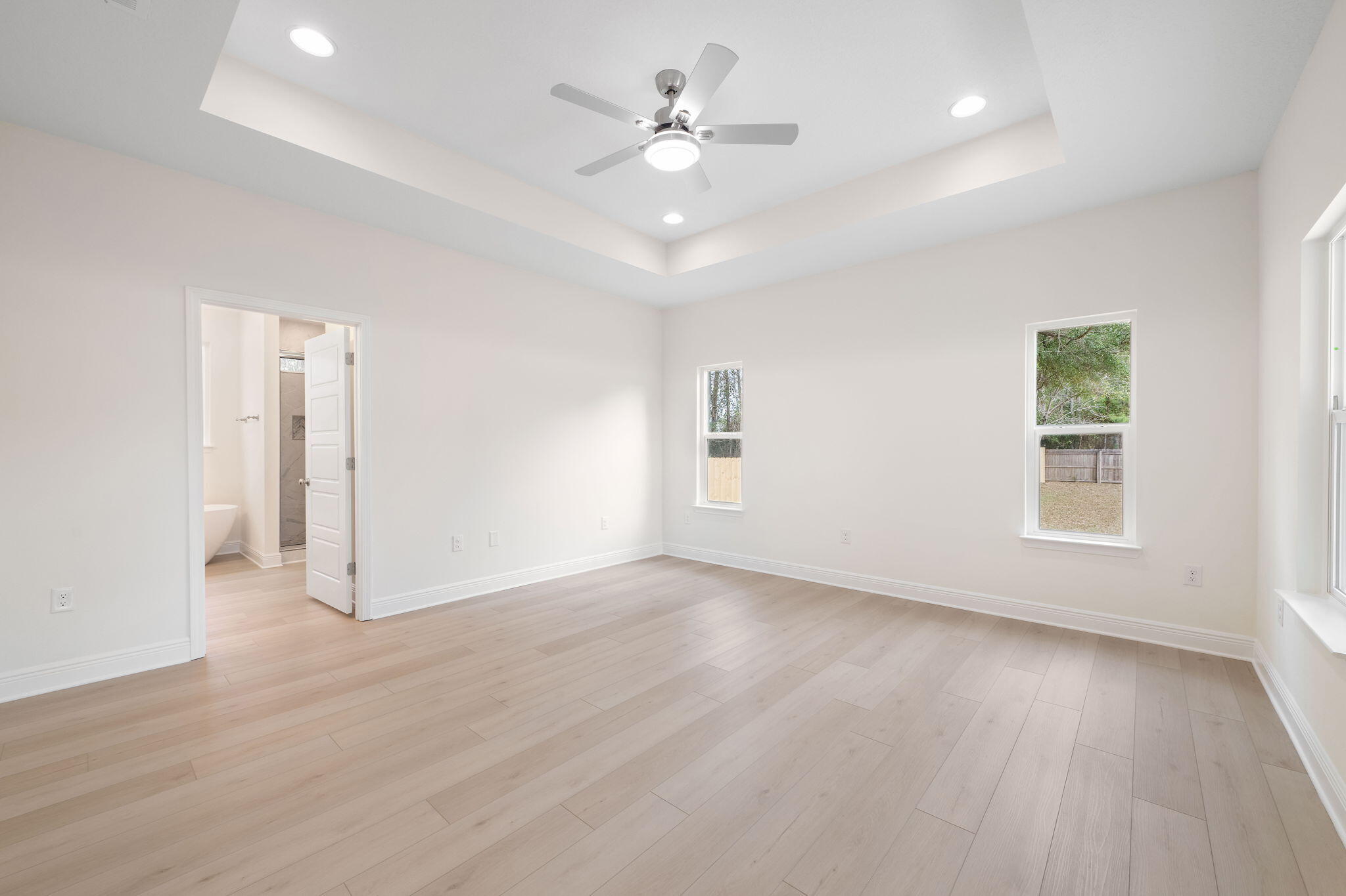 1854 Wheeler Road Gulf Breeze, FL 32563 - Photo 10 of 11 wooden floor in an empty room with a window