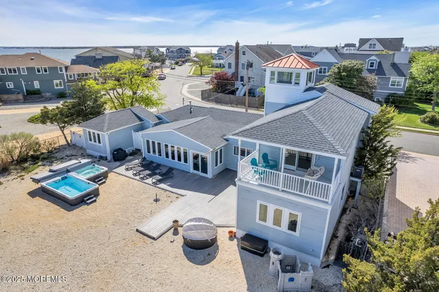 a aerial view of a house with outdoor space