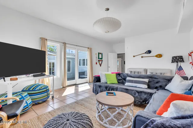 a view of a balcony with two chairs and a table