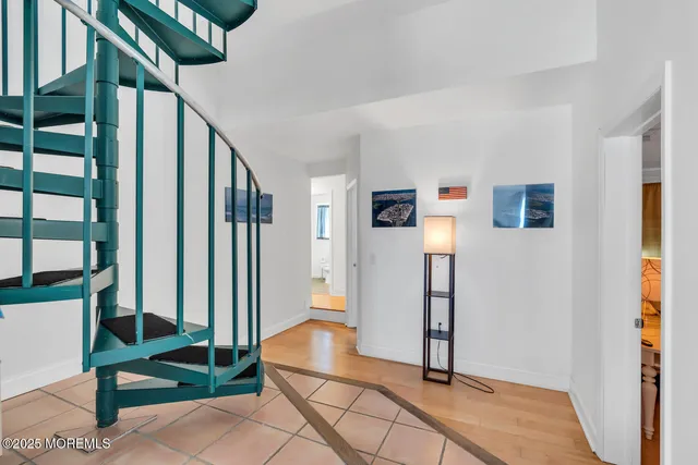 a view of a terrace with wooden floor and city view