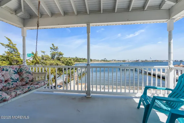 a view of a swimming pool with an ocean view