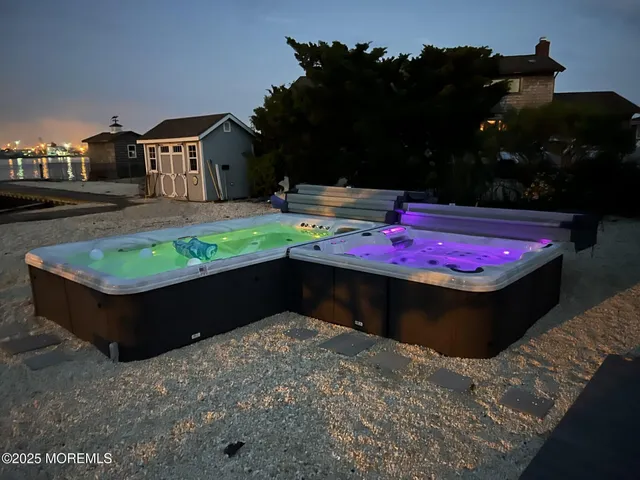 a kitchen with stainless steel appliances a sink stove top oven and cabinets