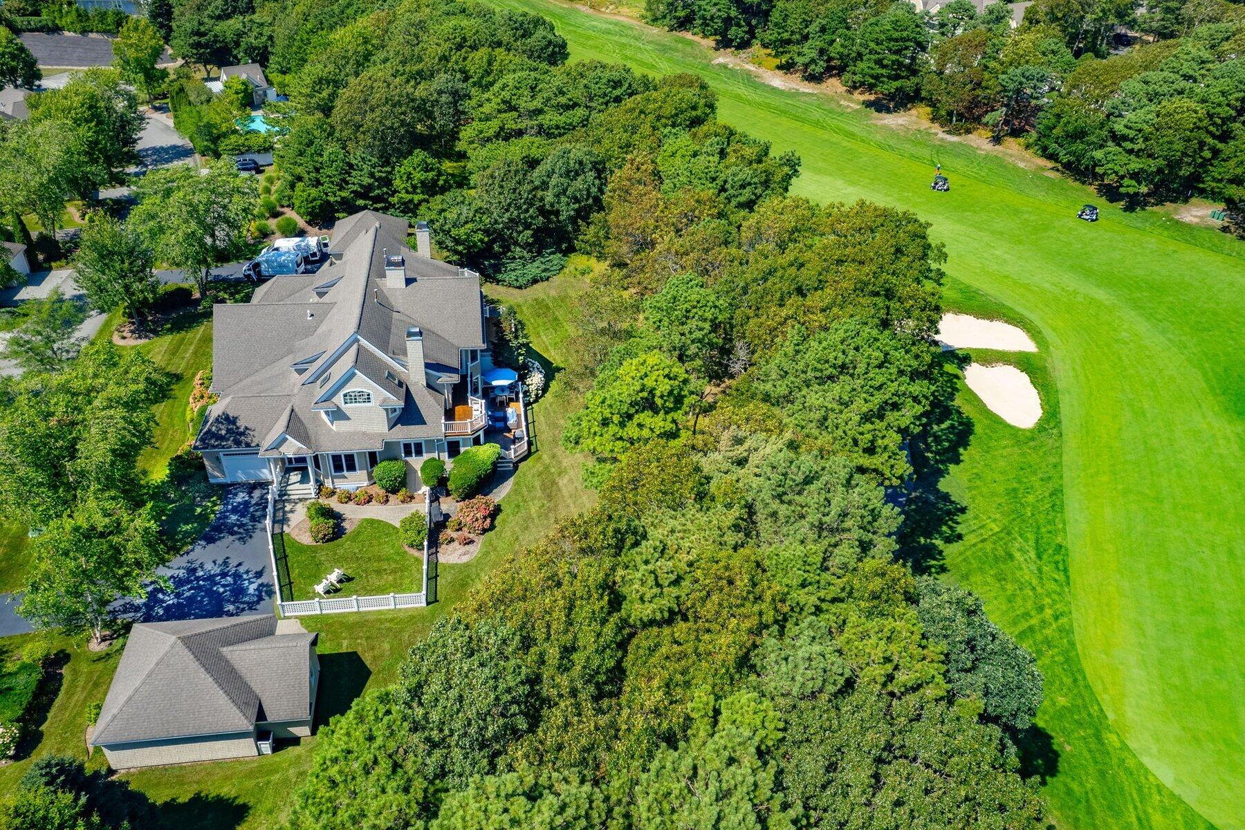 9 Vineyard Reach Mashpee, MA 02649 - Photo 13 of 60 an aerial view of a house with a yard