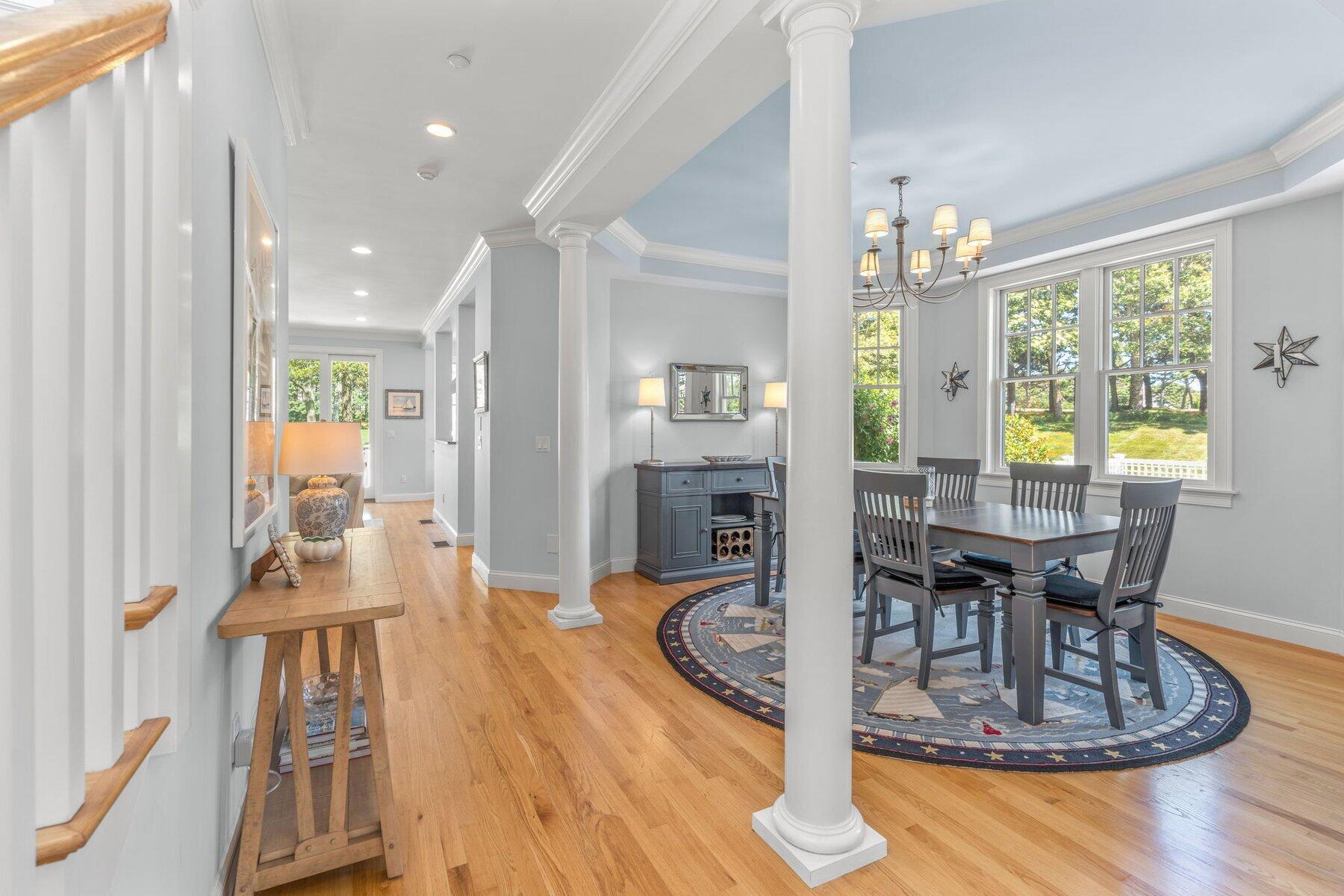 9 Vineyard Reach Mashpee, MA 02649 - Photo 22 of 60 a view of a dining room with furniture window and wooden floor