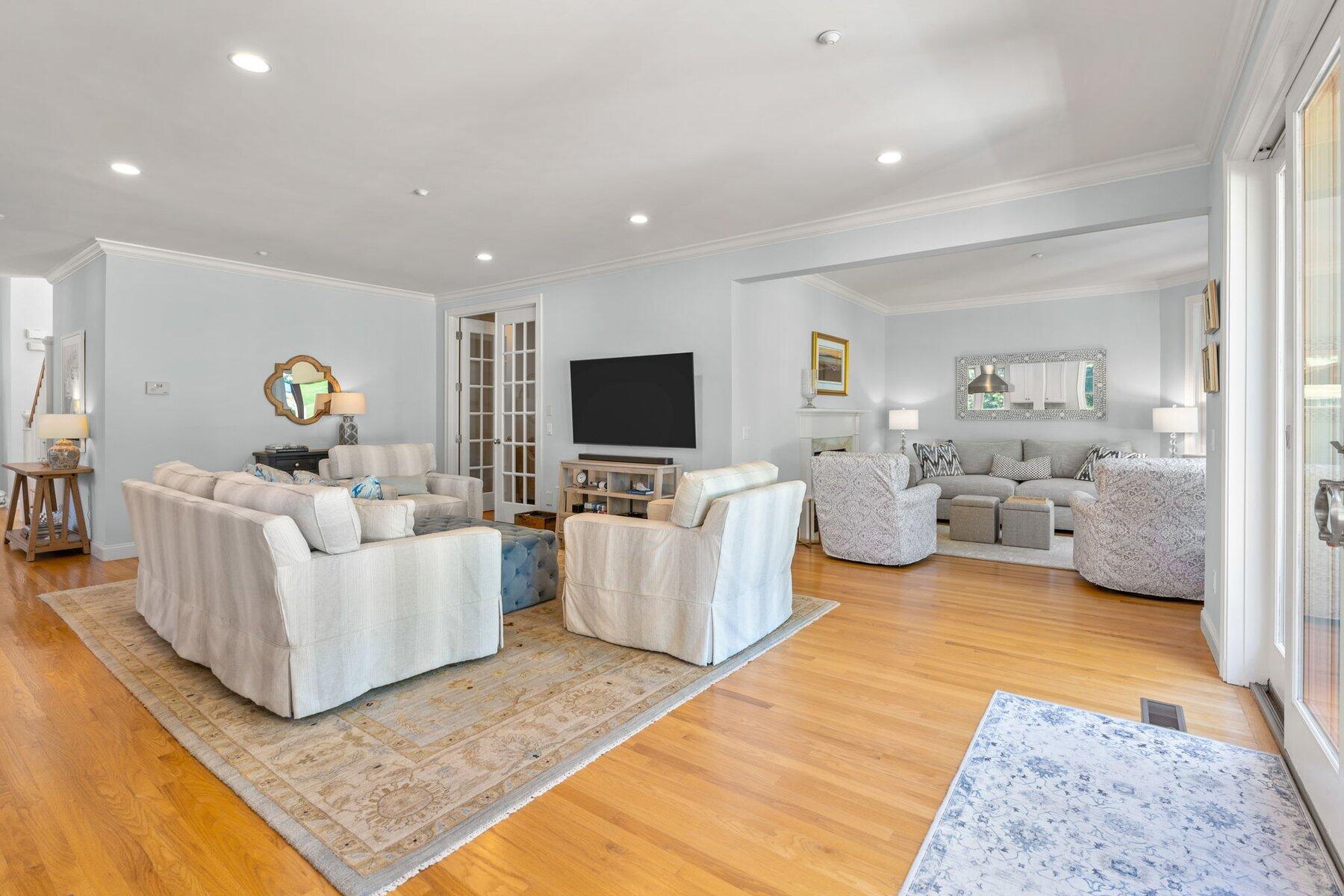 9 Vineyard Reach Mashpee, MA 02649 - Photo 25 of 60 a living room with furniture and a flat screen tv