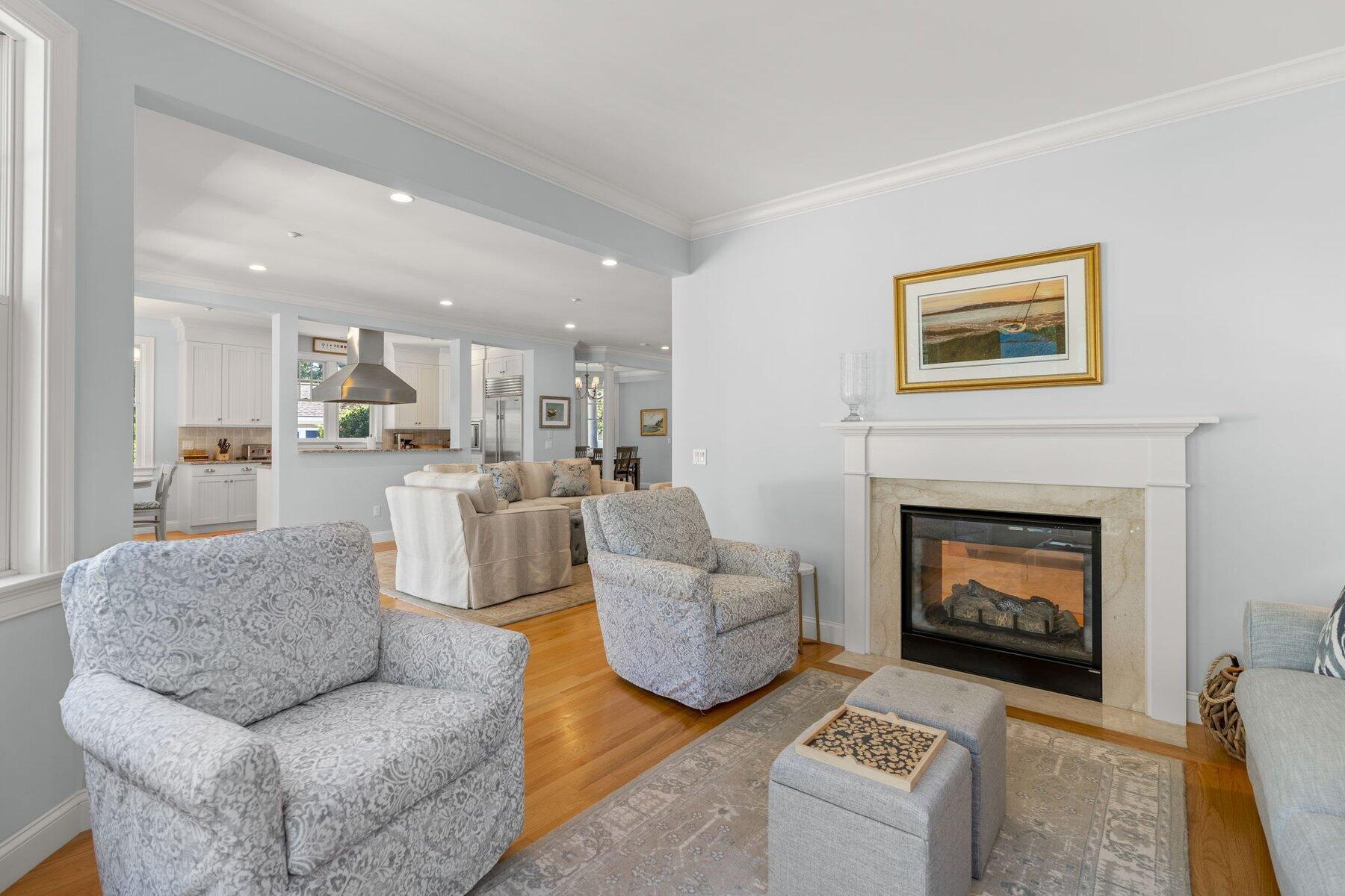 9 Vineyard Reach Mashpee, MA 02649 - Photo 26 of 60 a living room with furniture and a fireplace
