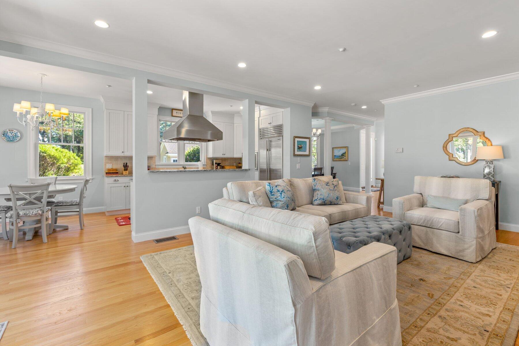 9 Vineyard Reach Mashpee, MA 02649 - Photo 28 of 60 a living room with furniture and wooden floor