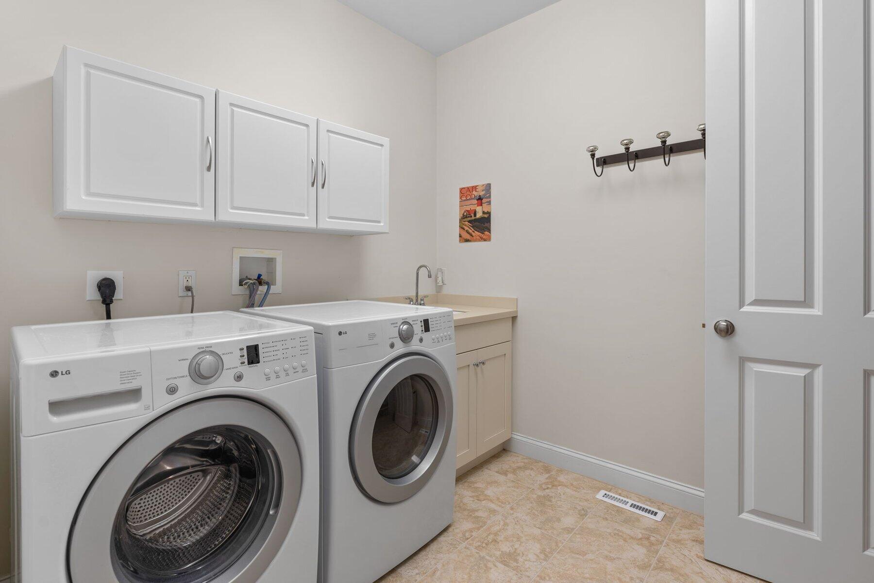 9 Vineyard Reach Mashpee, MA 02649 - Photo 35 of 60 a utility room with dryer and washer