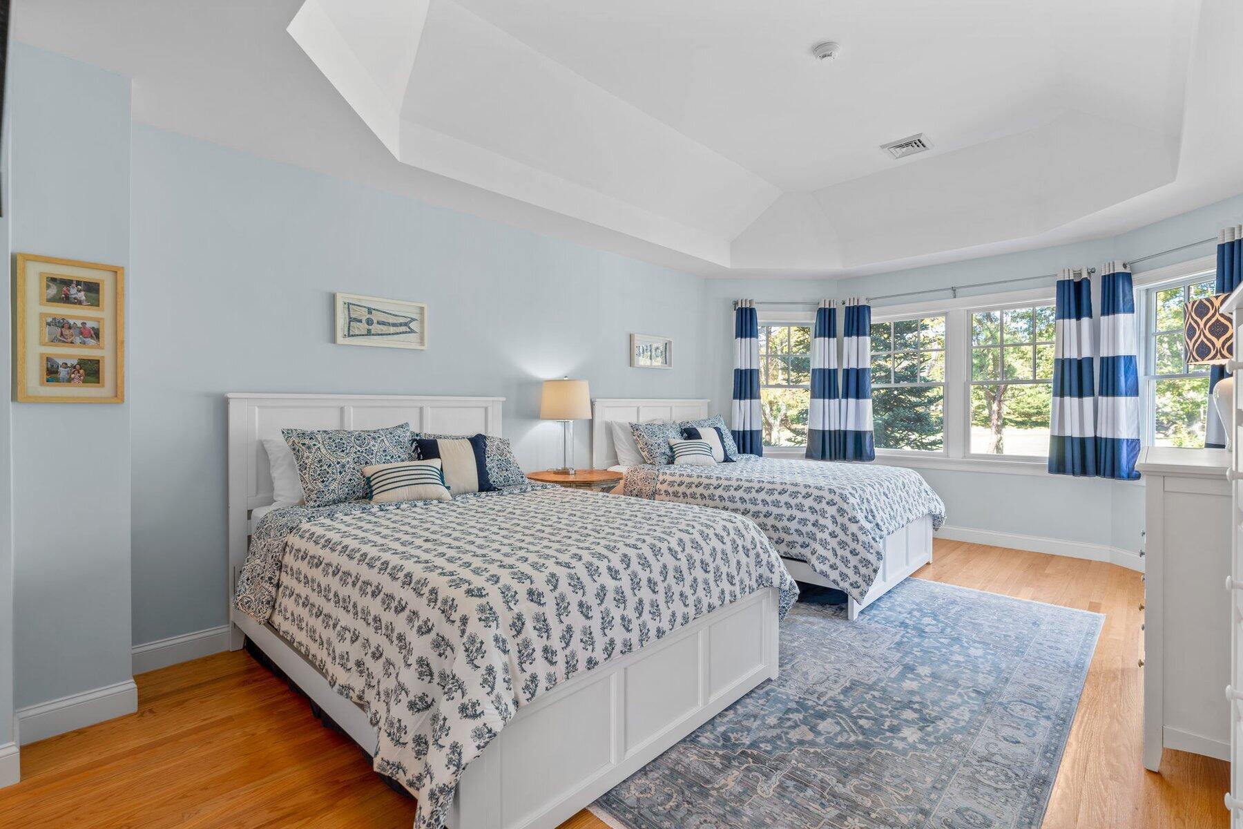 9 Vineyard Reach Mashpee, MA 02649 - Photo 38 of 60 a bedroom with bed and large window