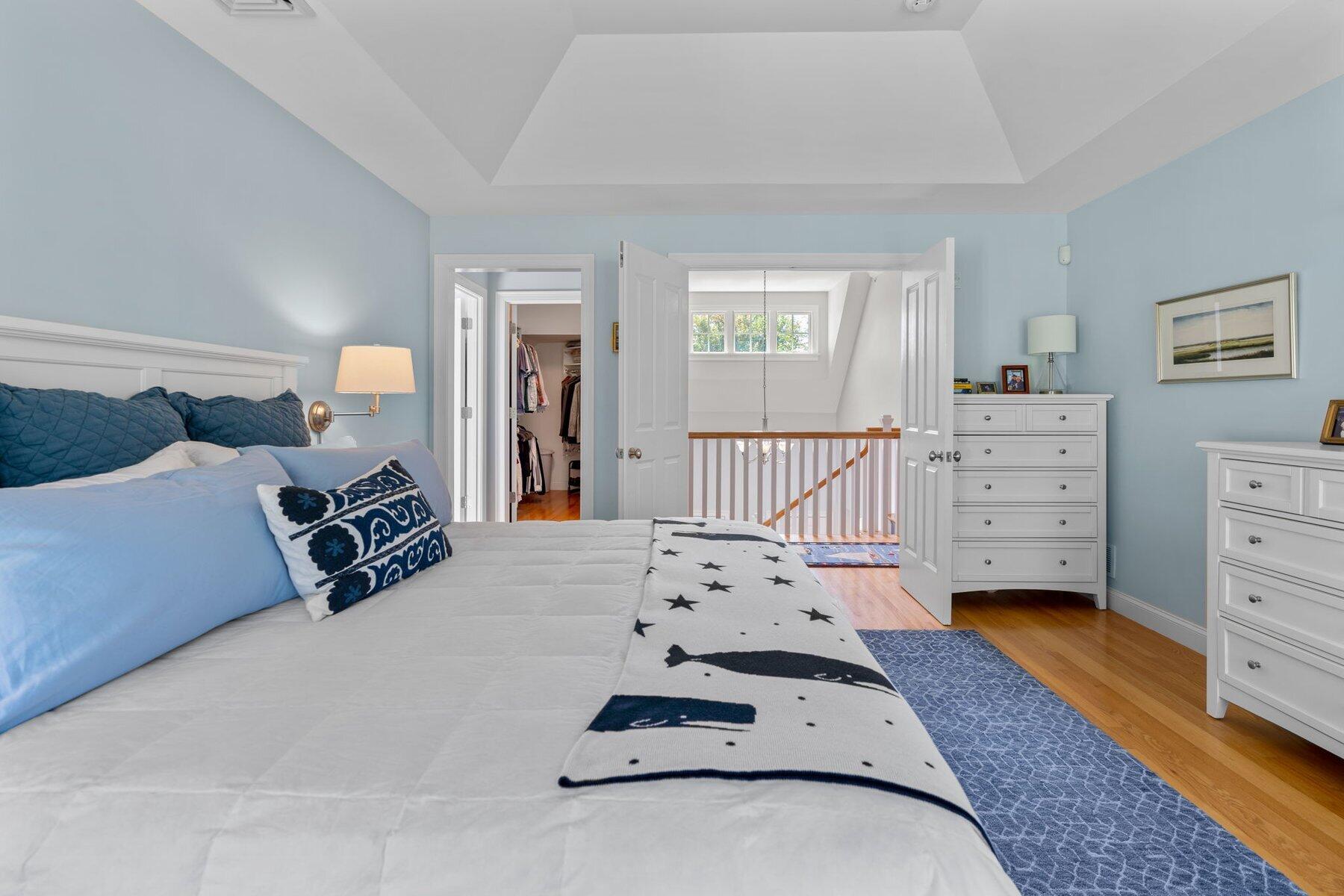 9 Vineyard Reach Mashpee, MA 02649 - Photo 43 of 60 a bedroom with a bed and dresser