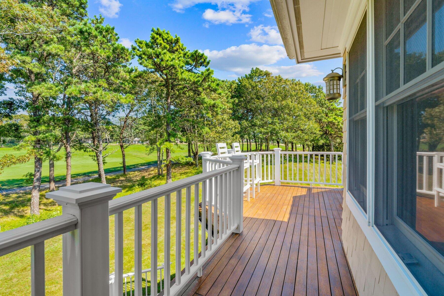 9 Vineyard Reach Mashpee, MA 02649 - Photo 45 of 60 a view of a balcony with wooden floor