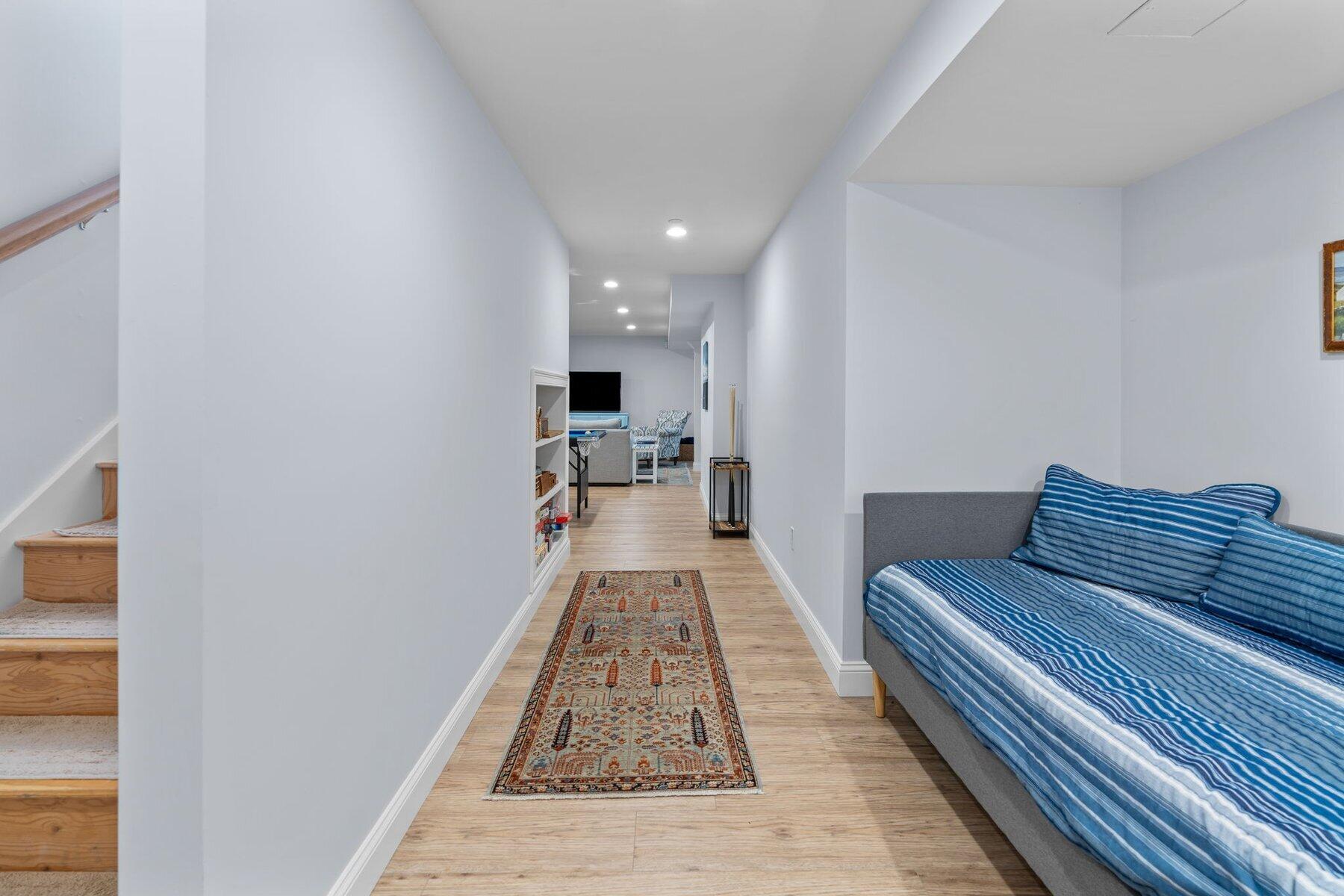 9 Vineyard Reach Mashpee, MA 02649 - Photo 48 of 60 a bed room with two beds and a couch