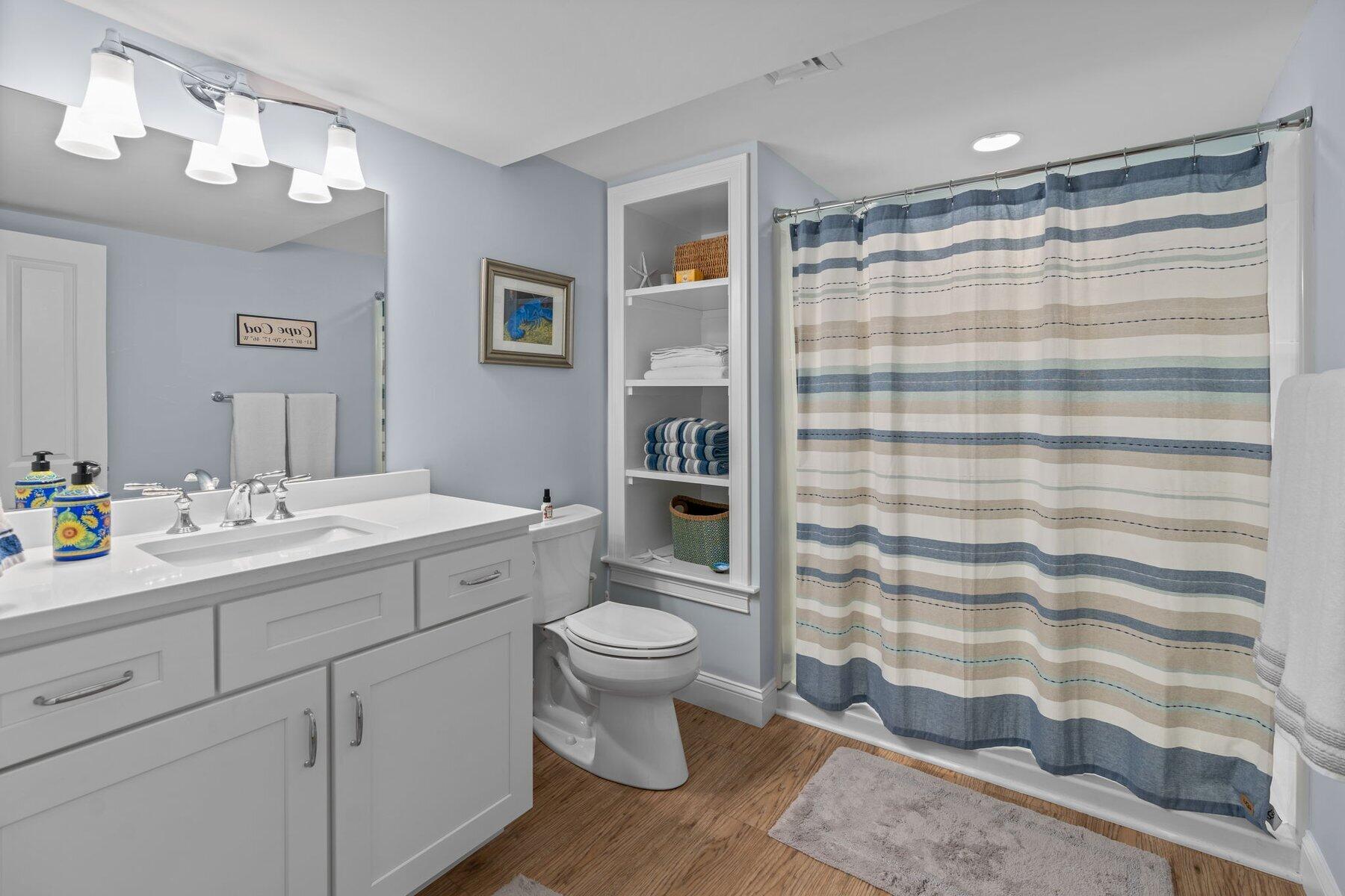 9 Vineyard Reach Mashpee, MA 02649 - Photo 53 of 60 a bathroom with a sink toilet and shower