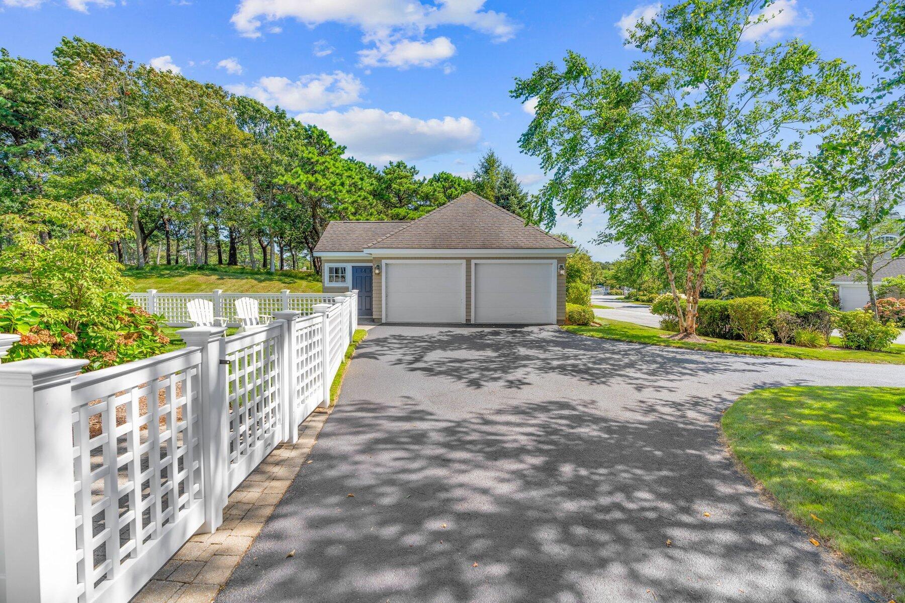9 Vineyard Reach Mashpee, MA 02649 - Photo 6 of 60 a view of a house with backyard and tree
