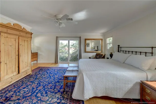 a bed room with a bed and a window